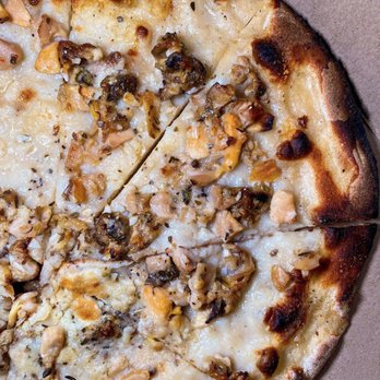Frank Pepe Pizzeria Napoletana signature dishes White Clam Pie, Margherita Pie, and Mushroom & Gorgonzola Pie 